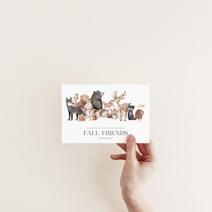 May include: A watercolor illustration of a group of woodland animals, including a bear, deer, fox, owl, squirrel, and rabbit. The animals are arranged in a line, with the bear at the front and the rabbit at the back. The illustration is on a white background with the text "Fall Friends Animal Edition".