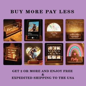 May include: Eight different personalised acrylic light-up signs with various designs and text. The signs are illuminated with warm white LED lights. The designs include a heart, a rainbow, a map, a constellation, a photo frame, and a collage of photos. The text on the signs includes names, dates, and messages. The signs are displayed on a purple background. Buy two or more and get free expedited shipping to the USA.