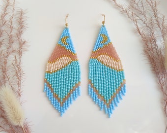 Long beaded earrings mountains landscape