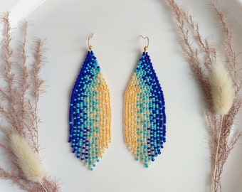 Long beaded earrings with blue and yellow gradient