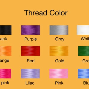 May include: A chart showing 12 different thread colors, including black, purple, grey, white, orange, red, gold, green, hot pink, lilac, pink, and blue.