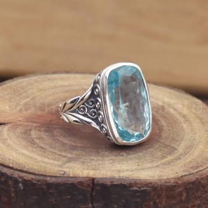 Handmade Sterling Silver Blue Topaz Ring: Floral Gemstone Jewelry