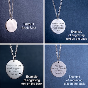 May include: A silver-colored pendant necklace with a circular pendant. The image shows examples of engraved text on the back of the pendant, including motivational quotes and a message to a parent. The necklace hangs on a silver chain.
