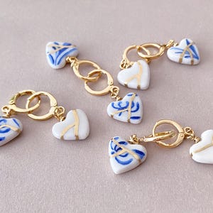 Koudporseleinen Kintsugi-hartoorbellen -18k verguld