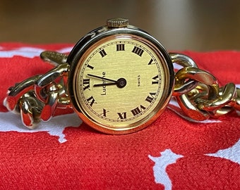 Élégante montre-bracelet pour dames suisse vintage des années 1960 Lucerne, boîtier de couleur dorée, montre de cocktail avec bracelet solide pour femme vintage, cadeau de montre habillée pour femme