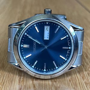 ヴィンテージ セイコー 7N43-9070 クォーツ腕時計 ブラック文字