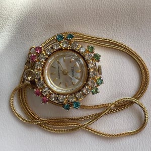 Elegant 1980’s Vintage women’s Pendant dress Tinko golden color case with mix colored zircons, Chic necklace watch, Retro watch ladies gift