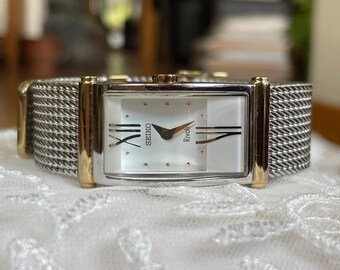 Elegant japansk damklocka från 1980-talet, vintage kvarts, med silverguldboett. Retro lyxigt tvåfärgat kvartsur.