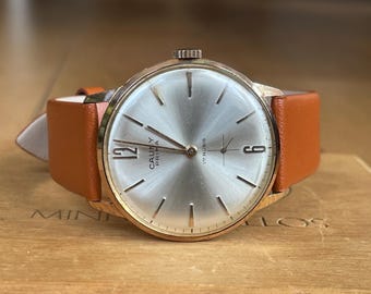 Zwitsers vintage mechanisch herenhorloge uit de jaren 60 verguld Cauny Prima, mechanisch herenhorloge, Zwitsers retrohorloge herencadeau, herenhorloge