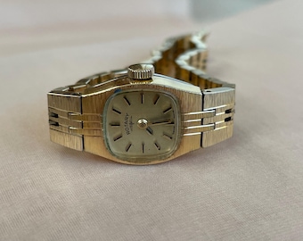 DOXA 手巻き腕時計 スイス製 ビンテージ シルバー ラウンドフェイス ヴィンテージ DOXA スイス製自動巻き腕時計、ラウンド型シルバー文字盤