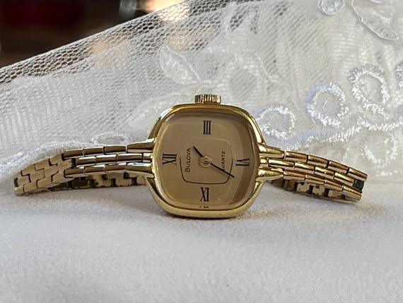 Elegant 1980s Vintage Swiss small quartz ladies dress watch Bulova golden  tone case, Vintage women quartz cocktail watch, Watch ladies gift