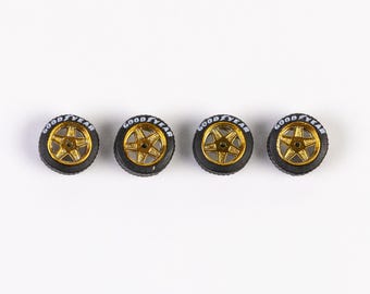 187 llantas doradas con letras estilo "Ferrari"