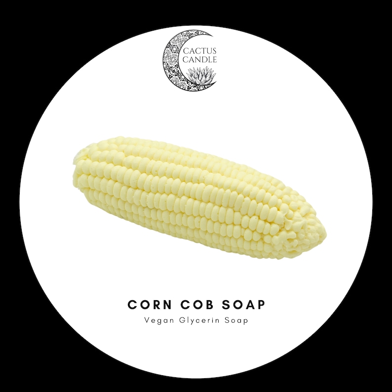 May include: A yellow corn cob shaped vegan glycerin soap. The soap is on a white background with the text "CORN COB SOAP" and "Vegan Glycerin Soap" below it.