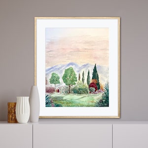 May include: A watercolor painting of a landscape with a row of trees in the foreground and a mountain range in the background. The sky is a soft pink and orange.
