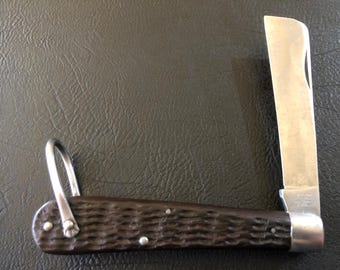 Early 1930's - Mid 1940's WWII Camillus U.S. Navy Rope Knife 4-Line Stamp, Dark Brown Jigged Delrin Handles.