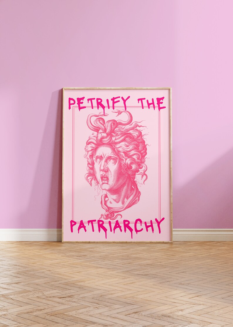 May include: Pink framed poster featuring a pink illustration of Medusa's head with snakes for hair. The text "Petrify the Patriarchy" is written in pink dripping letters.