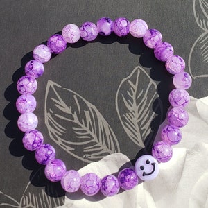Smiley Face and Glass Bead Bracelets