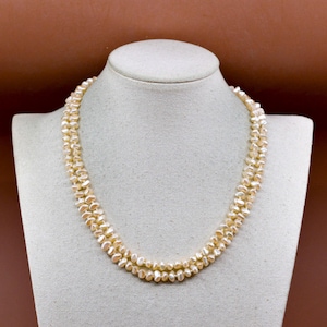 Slightly golden tone, women&#39;s beaded, long  necklace