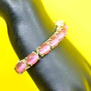AAvon, silver tone with pink beads, womens , stretch bracelet