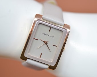 Anne Klein, or rose et tons gris, montre-bracelet tendance pour femme