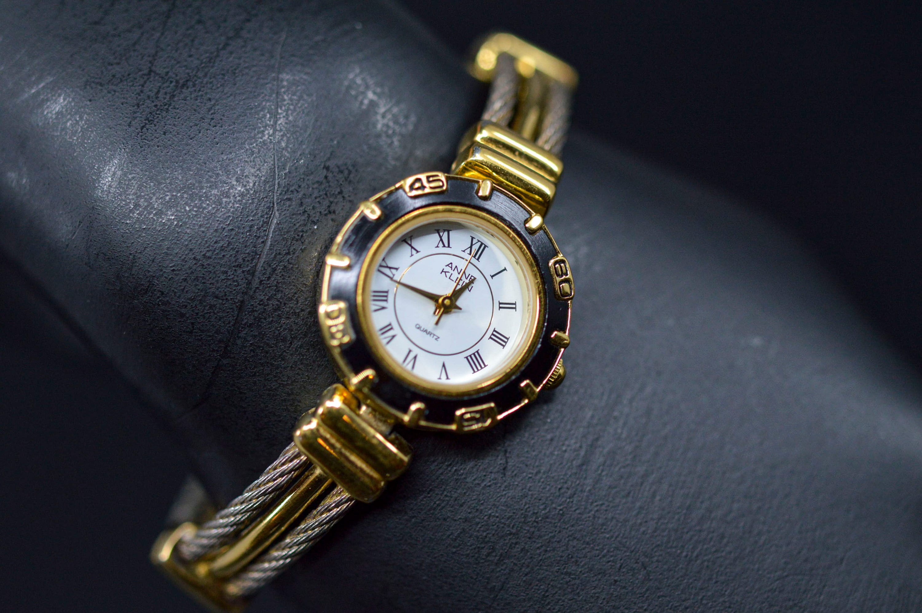 Gold Ann Klein watch with rich black face and bracelet style band with classic Anne Klein Watch - Etsy main image 3