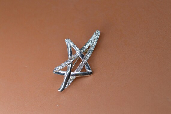 AK , siler tone with crystals, women's brooch