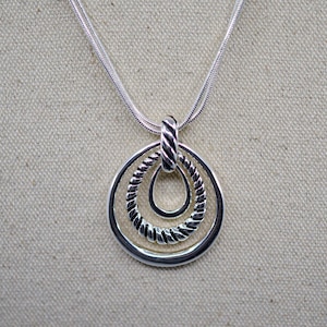 Silver tone, womens fashion, pendant necklace 26 inches long