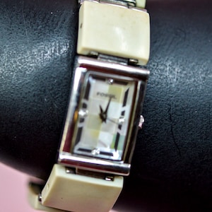 Fossil silver and white tone, womens wrist watch