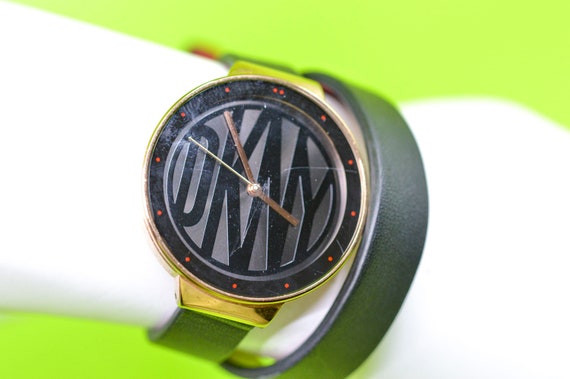 DKNY gold tone with Black dial wrap around bracelet womens wrist watch