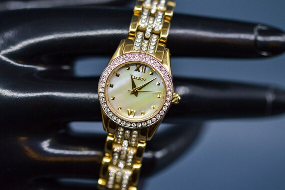 Gold watch with crystals outlet