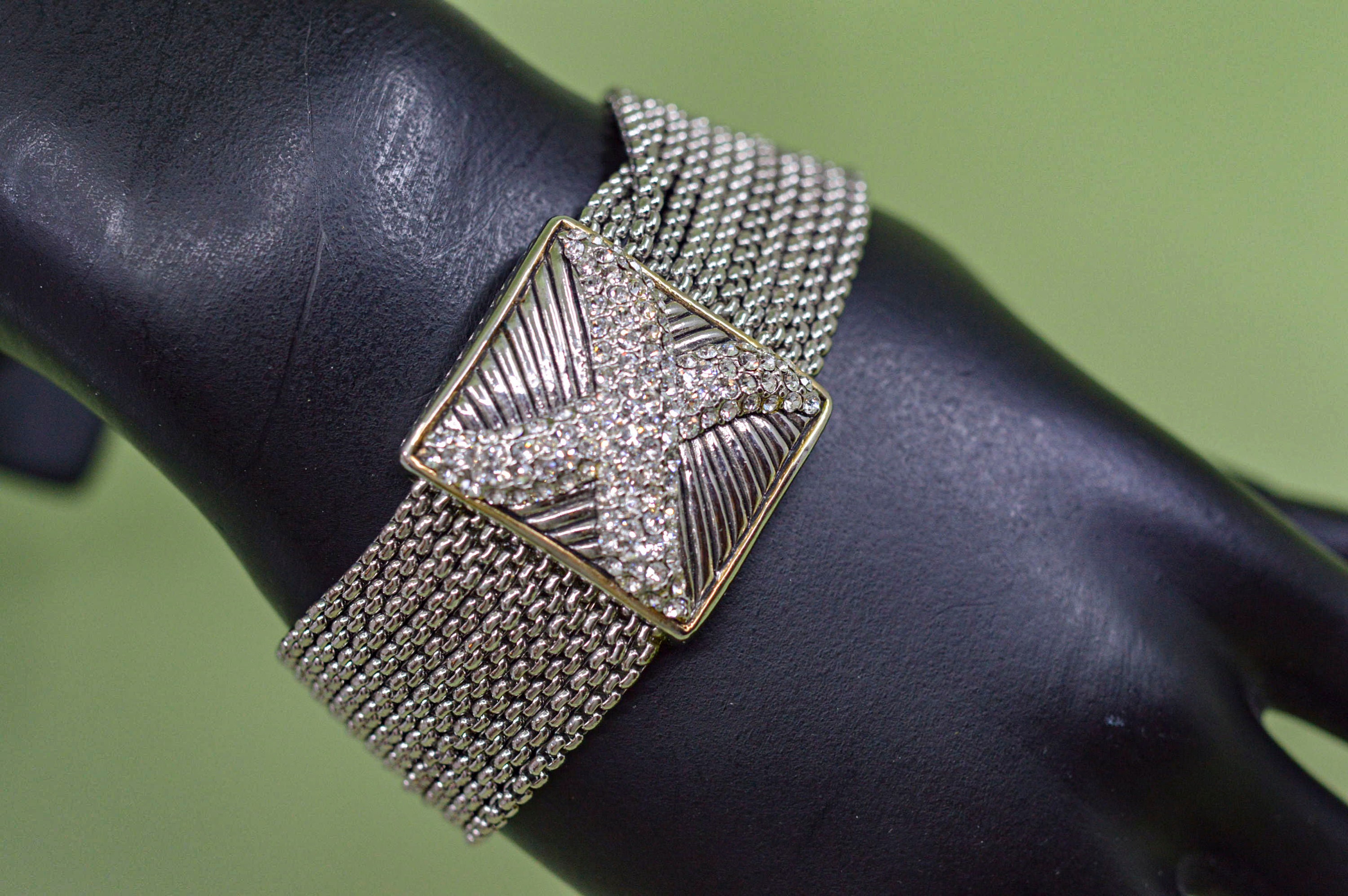 Silver tone with crystals, womens, fashion bracelet with magnetic clasp