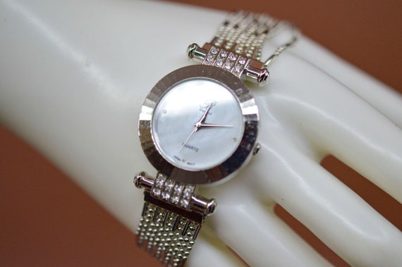 Silver tone with crystals, mop dial, womens watch - image 7