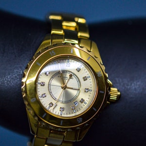 Sturling Original, gold tone, womens wrist watch