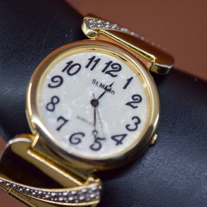 St. Martin, gold tone with crystals, chunky, fashion wrist watch