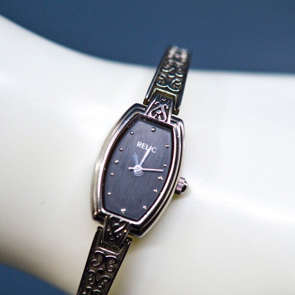 Relic , silver tone with black dial, womens fashion wrist watch