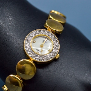 Premier Design, gold tone with crystals, womens, fashion watch