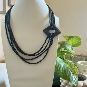 Multi-strand necklace handmade with lava stone and stainless steel