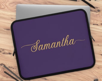 May include: Purple laptop sleeve with a gold cursive name "Samantha" on the front.