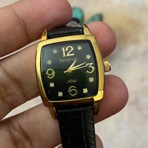 Vintage Armitron Now Gold Tone Black Leather Wrist Watch