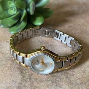 Nine & Co. Silver Tone and Gold Tone Women’s Wrist Watch
