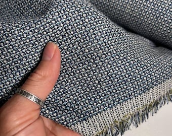 Soft Italian wool, high-quality fabric. Wrinkle-resistant, perfect for suits, blazers, and dresses.