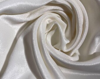 Soft, creamy silk velvet. A luxurious natural silk, perfect for wedding dresses, evening gowns, and blouses.