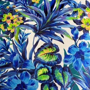 Natural Italian silk with a blue floral pattern. Light, flowing fabric for airy evening dresses, summer blouses, scarves.