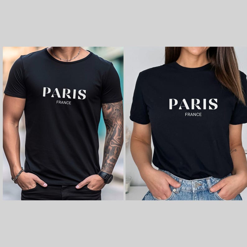 May include: Two black t-shirts with white text that reads "Paris France".
