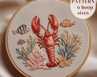 May include: Embroidered hoop art featuring a vibrant red lobster, two fish, and coral. The design is set against a neutral background within a wooden hoop. Text on the image reads "PDF PATTERN + 6 hoop sizes."