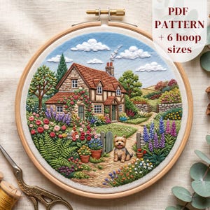May include: An embroidery hoop containing a fabric panel with a stitched scene of a stone cottage, a garden with colorful flowers, and a small dog. The text "PDF PATTERN + 6 hoop sizes" is visible in the upper right corner of the image.