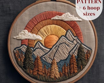 May include: Embroidered landscape art in a wooden hoop. The design features a sunset with a rainbow, mountains, trees, and clouds. The text "PDF PATTERN + 6 hoop sizes" is visible. The artwork is stitched with orange, yellow, brown, blue, and white thread.
