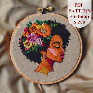 May include: A detailed embroidery hoop art piece featuring a profile of a woman with a floral crown. The artwork uses orange, pink, yellow, and green thread. The text "PDF PATTERN + 6 hoop sizes" is visible.