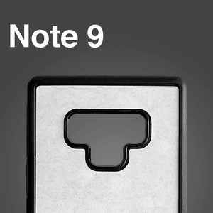 May include: Black phone case with a cutout for the camera lens. The case has the text "Note 9" printed on it.