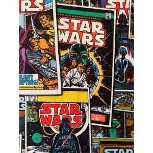 May include: A fabric featuring a collage of Star Wars comic book covers. The covers display various characters, including Darth Vader, Luke Skywalker, and other figures from the Star Wars universe. The color palette includes red, black, and yellow.